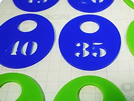 Slotted numbers made of transparent and colored